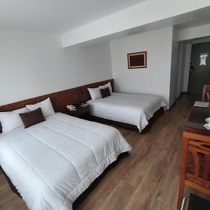 Habitación con 2 Camas Individuales